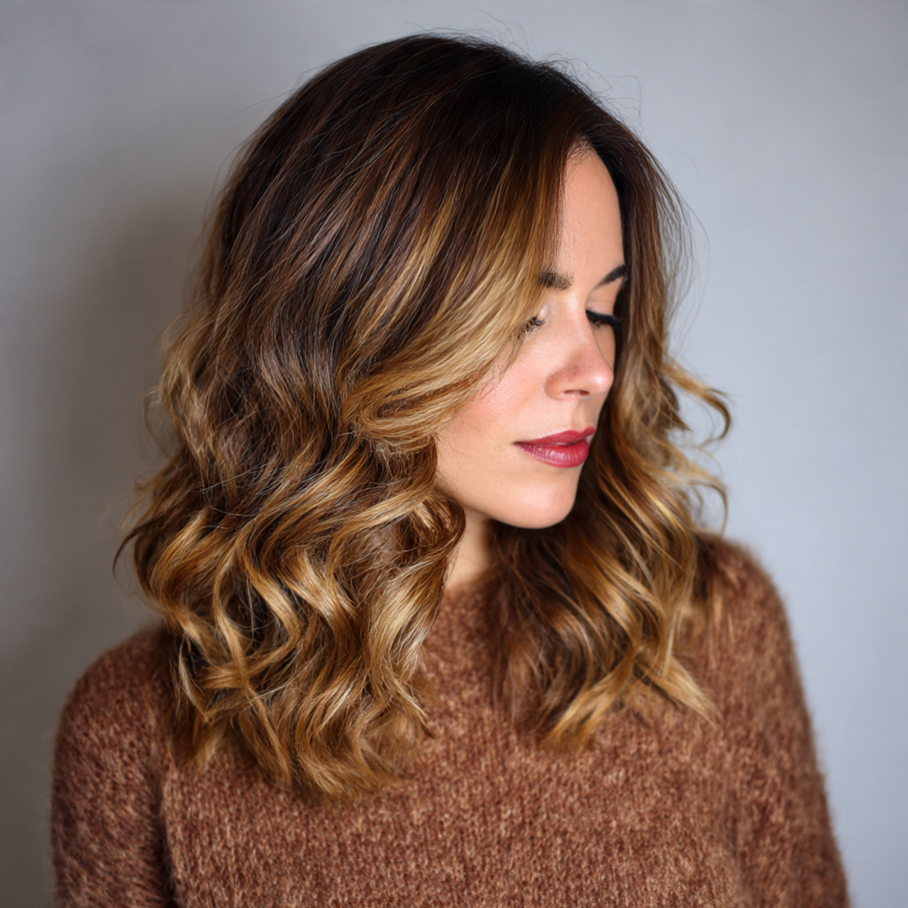 Warm Caramel Balayage: The Glossy Hair Trend Everyone’s Falling For 24 medium length hair styled in loose curls with